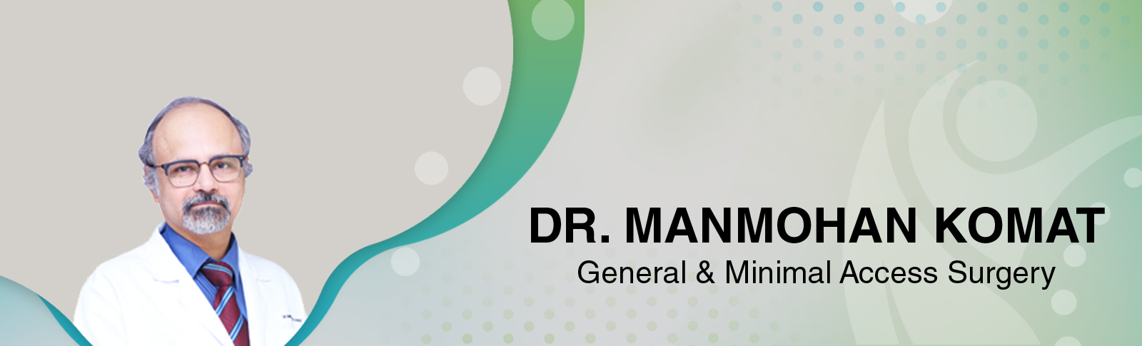 Dr. Manmohan Kamat